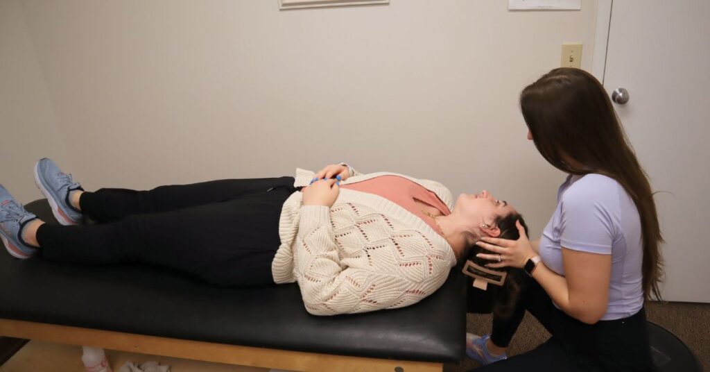 Photo of a patient working with physical therapist Megan Leach at Carolina Physical Therapy & Sports Medicine in Columbia, South Carolina, to address vertigo and dizziness issues.