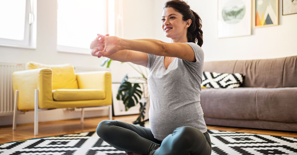 Pregnant woman working on strengthening exercises.
