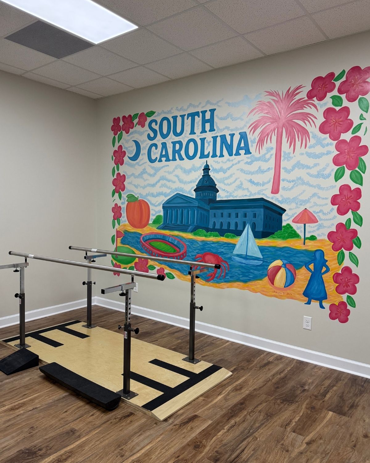 Colorful mural inside Carolina Physical Therapy & Sports Medicine Centerville location, creating a fun and welcoming atmosphere for patients.