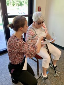 Emily, DPT at Carolina Physical Therapy and former Physical Therapy Student intern, working with a patient in our Columbia, SC clinic.